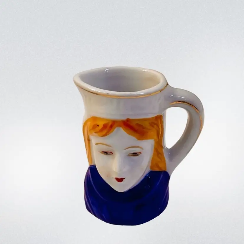 Vintage Miniature Pitcher/Toothpick Holder Hand Painted Female Face Made In iSCO Japan 
2” T x 1-3/4” W