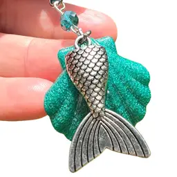 Blue-Green Resin Sea Shell & Metal Mermaid Tail Charm Necklace. Handmade by me 🫶. Overall 2" drop length.