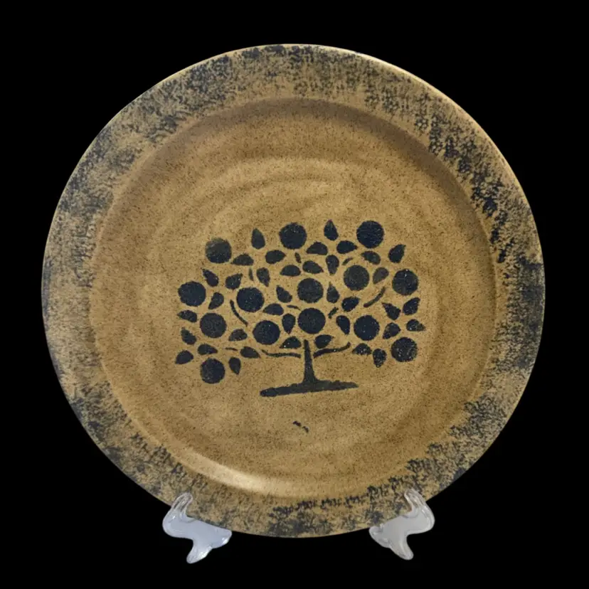 Handmade spongeware ceramic plate with a fruit tree motif.