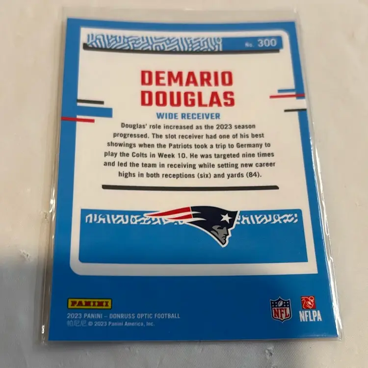 2023 Panini Donruss Optic - Rated Rookie Holo Prizm #300 Demario Douglas (RC)