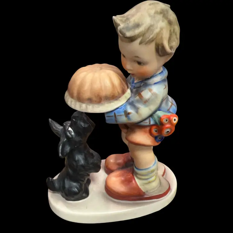 Goebel Hummel "Begging His Share" figurine featuring a boy and a dog.stamp On Bottom