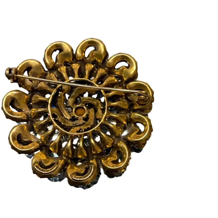 Medallion Style Brooch In Dark Blue And Light Blue Rhinestones.