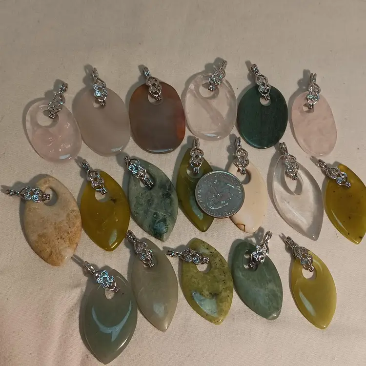 Seventeen Mixed Gemstone Pendants with Bails