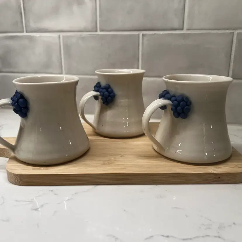 3 Handmade Pottery Mugs with blue grape design around handle, 3 pottery mugs signed by artist