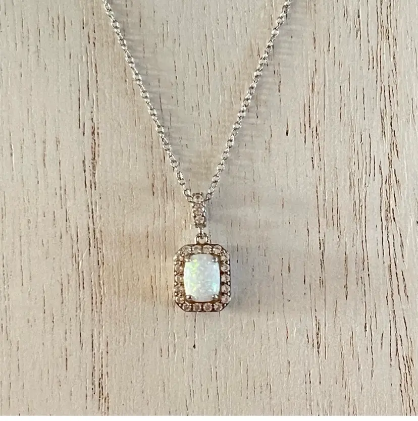 Opal and white sapphire halo solitaire necklace sterling silver