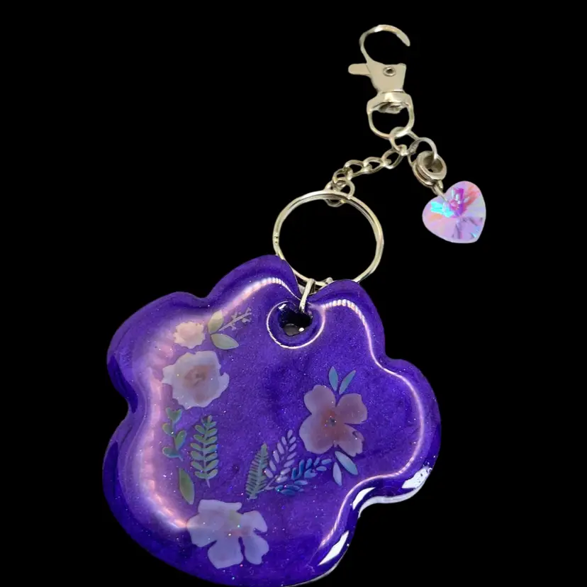 Purple Dog Paw with Flower Design Keychain Bag Clip. Sprinkled with Glitter and Accented with Purple Heart Charm.
