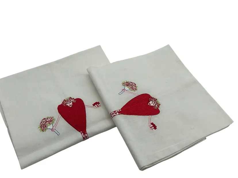 Set of two anthropomorphic kitchen hand towels heart lady with flowers and gift