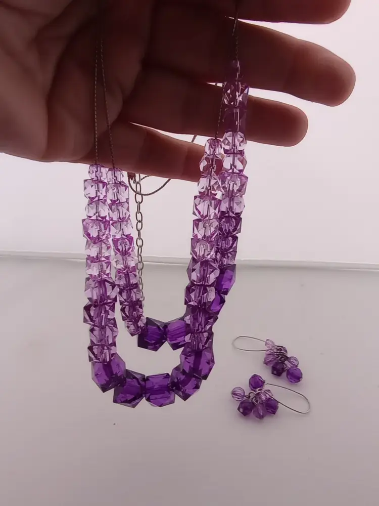 Purple faceted bead necklace and earrings