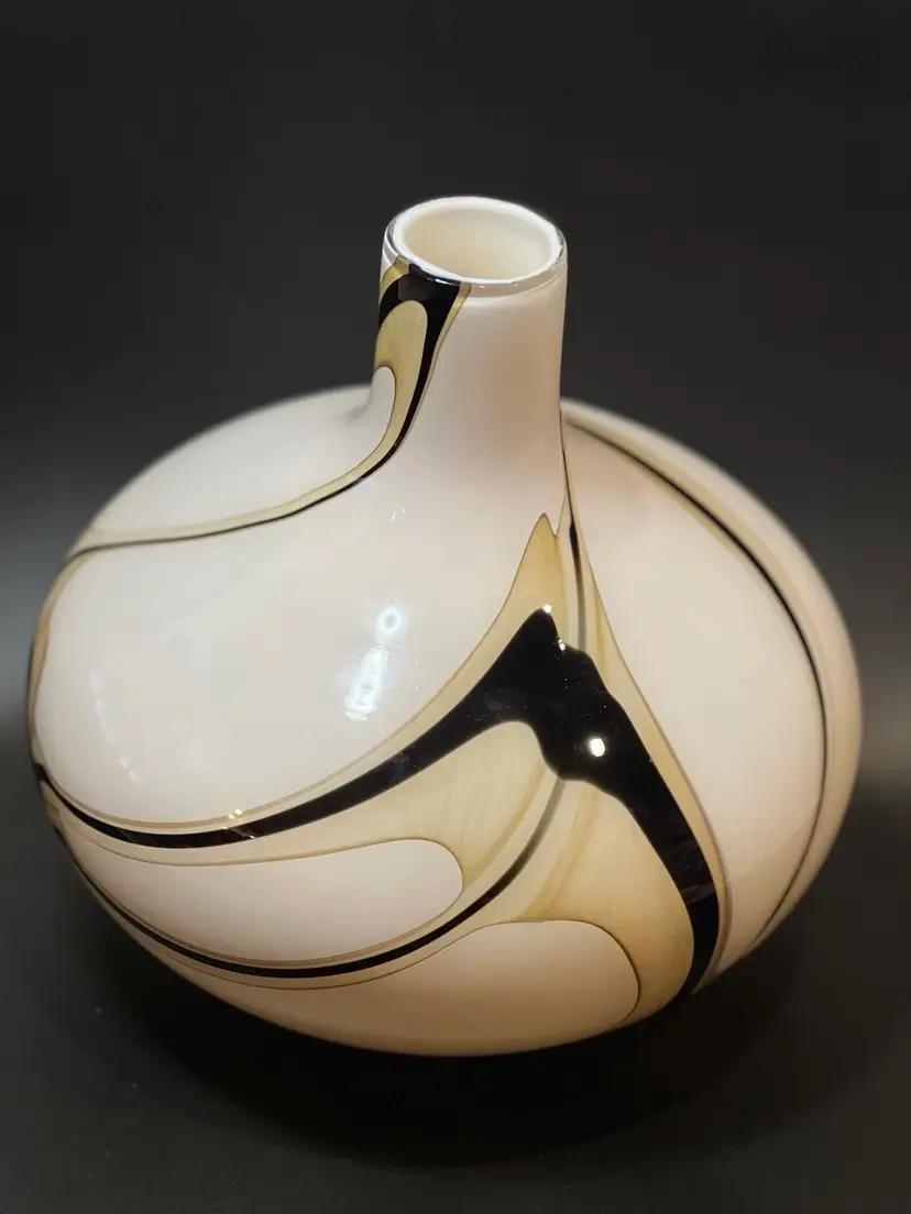 Wonderfully Beautiful Vintage Murano Vase, Italy! Swirl Pattern Throughout Simply Amazing! 
I’ve described the item to the best of my ability. The measurements are in the pictures. I do not see any noticeable flaws. I will pack this item with great care, and should I overcharge you tremendously for shipping. I will gladly give you a credit, as No One Likes To Be Overcharged For Shipping !  
Thank you for shopping Vintage & Vino.