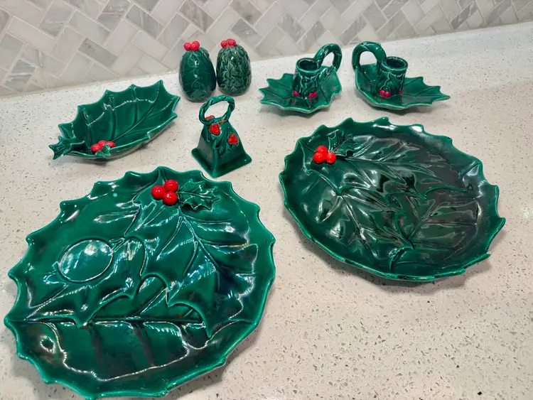 CHOICE $12, collection of vintage Lefton Green Holly ceramic Christmas dishes, including 1 plate, 1 tray, 1 trinket dish, a bell, set of candle holders, and salt/pepper shakers, likely from the 1960s or 1970s.