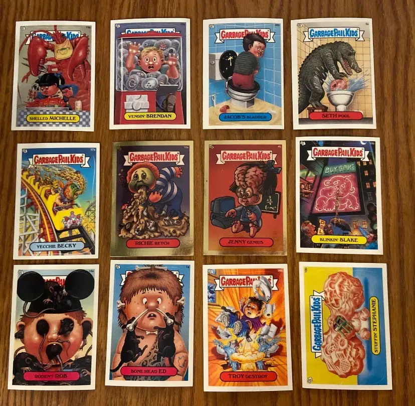 2003 Garbage Pail Kids 12 Card Lot - 2 Gold Cards And 10 Sticker Cards.


As seen in pictures. Very good condition!