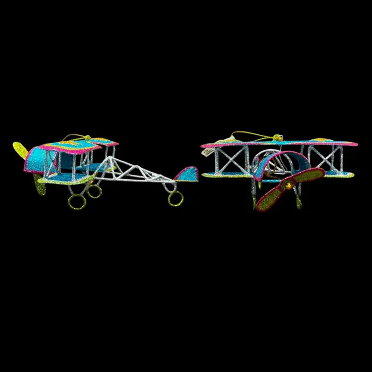 Vintage Pier One Metal Old Biplane Airplane Ornament
Blue Glitter With Pink, Gold And Green Accents 
$5 Each Or 2 For $8
Total Of 5 Available
