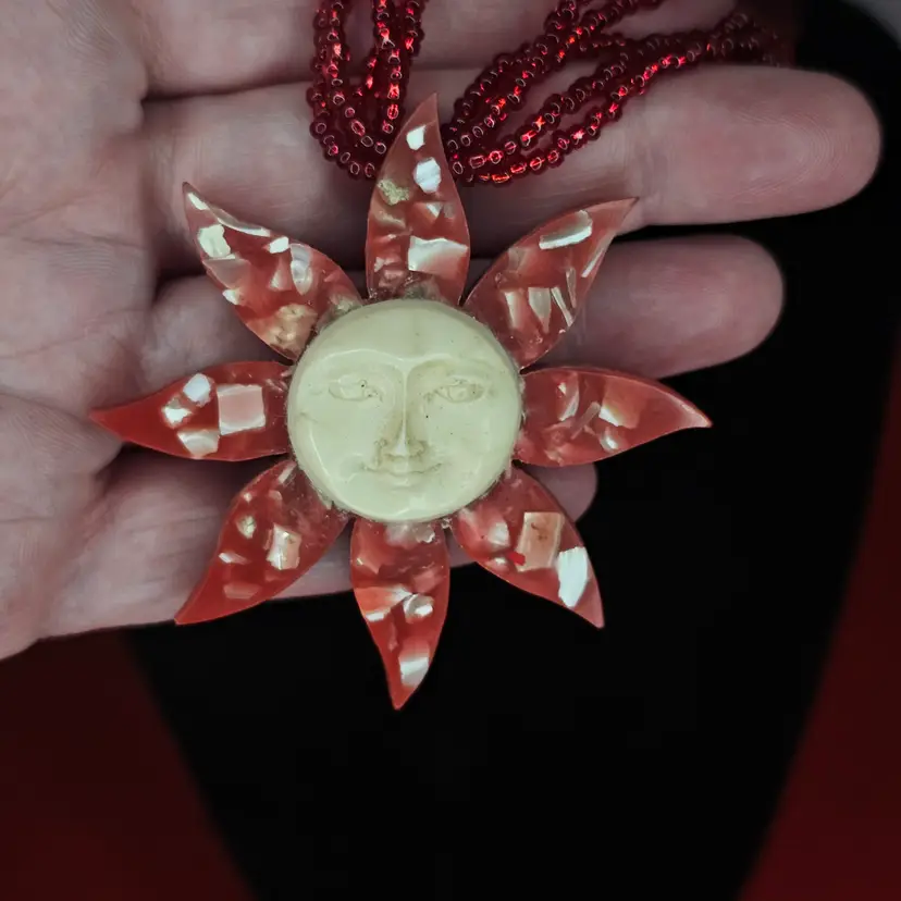 Mcm Vintage red confetti lucite sun pendant with face on multi stand seed bead necklace.