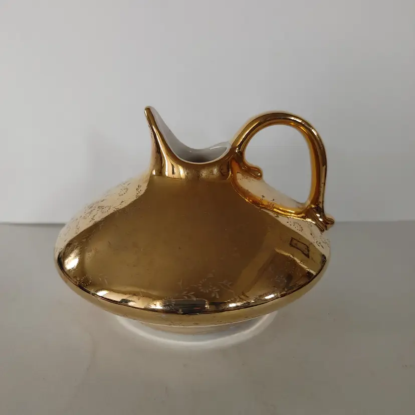 Savoy Weeping Gold Creamer. Floral pattern in gold. No chips or cracks. 4.5w x 3h.
