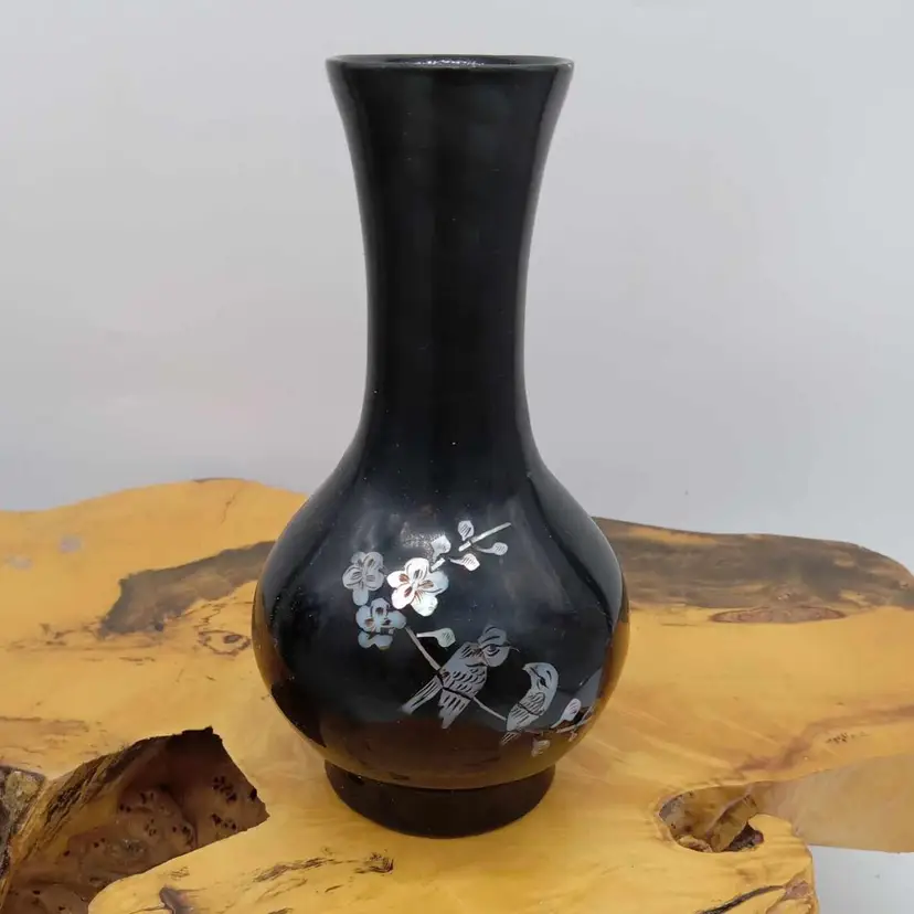 Black vase with mother of pearl birds and branches