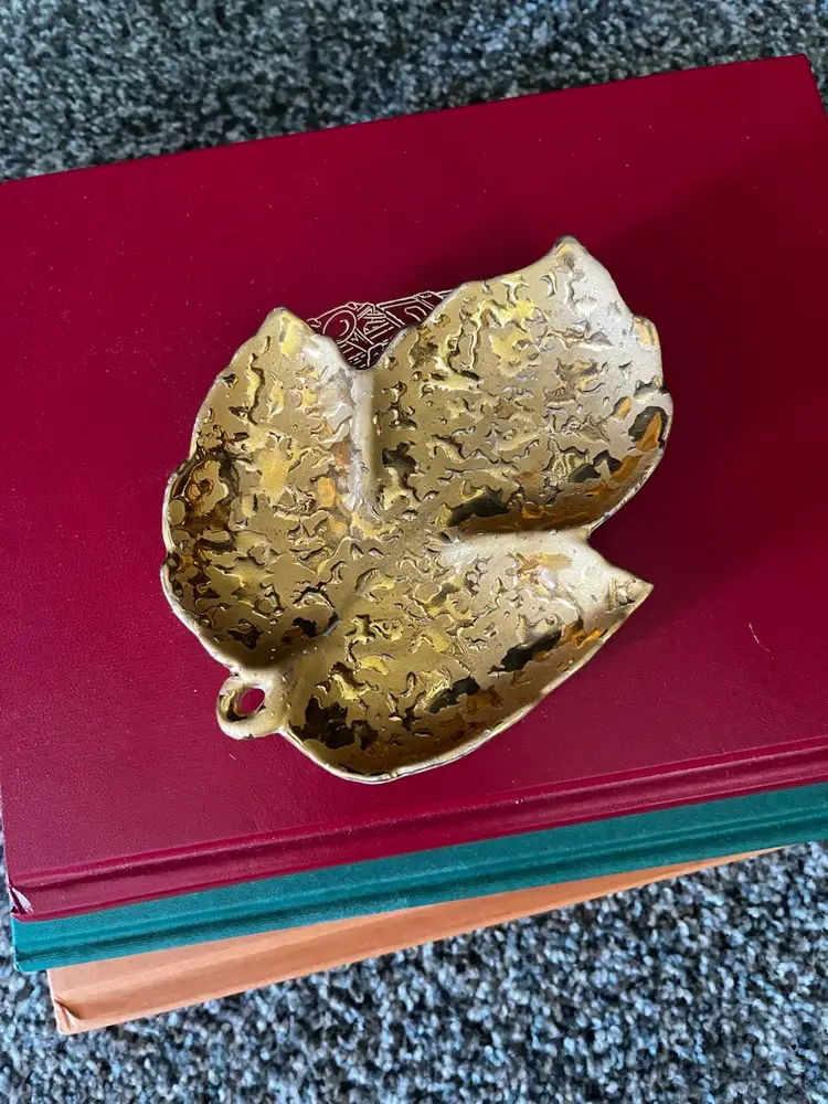 A vintage "Weeping Bright Gold" leaf-shaped trinket or candy dish