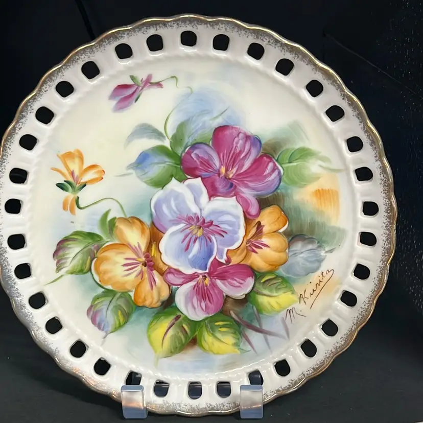 This is a mid-century hand-painted porcelain plate.Norleans, Japan, Artist Signed.