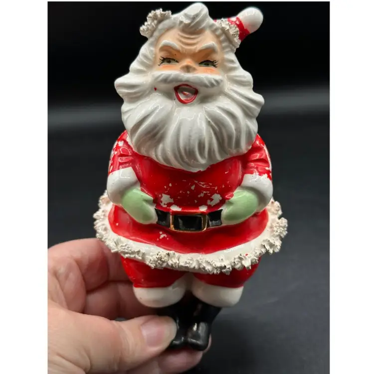 vintage Lefton figurine features a festive Santa Claus design with spaghetti Trim
