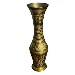 Vintage etched brass ewer with floral designs and black finish.- Made In India Sticker On Bottom.
12 inches tall