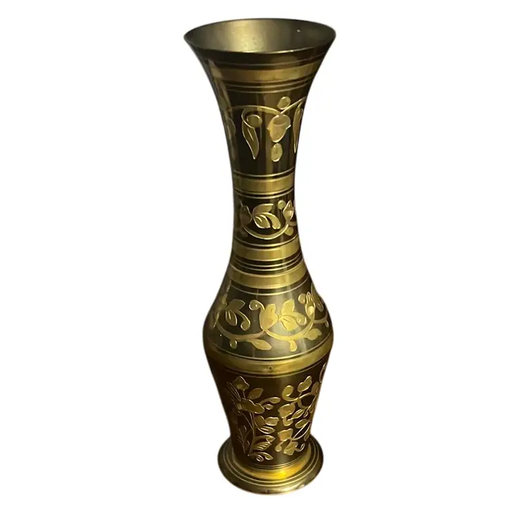 Vintage etched brass ewer with floral designs and black finish.- Made In India Sticker On Bottom.
12 inches tall