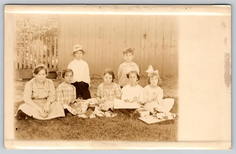 Postcard RPPC Children Opening Toy Doll Boxes Outside Real Photo Girls Boys - 9220