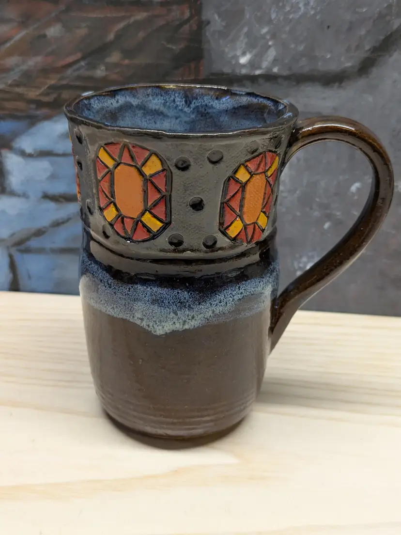Handcrafted Ceramic Pottery Mug Coffee and Tea signed Mary Walsh Earthy Orange Brown Blue Floral Motif