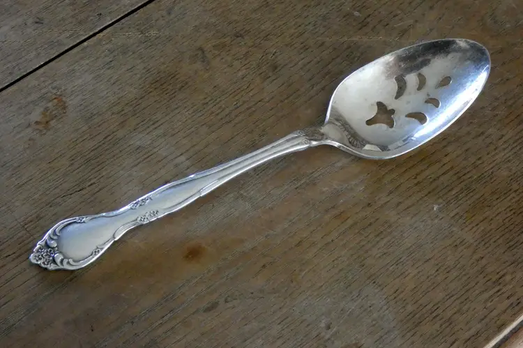 Silverplate Slotted Spoon Affection Pattern by Oneida