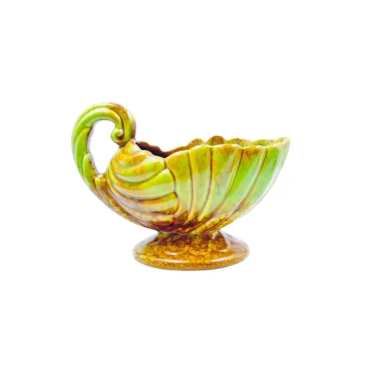 FOOTED GRAVY BOAT SERVER
By Heager Pottery USA
1940-50
Holiday Hosting 

Shell Shape 
Twist Handle 
Brown Green Glaze

Fall Autumn Harvest Thanksgiving 
Halloween Christmas Party Celebration Gift Planter