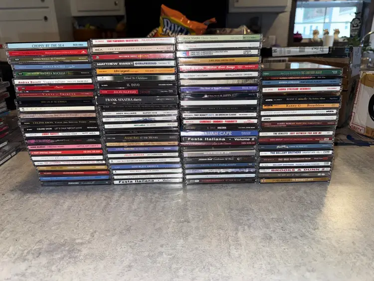 89 assorted music CDs Few may still be sealed