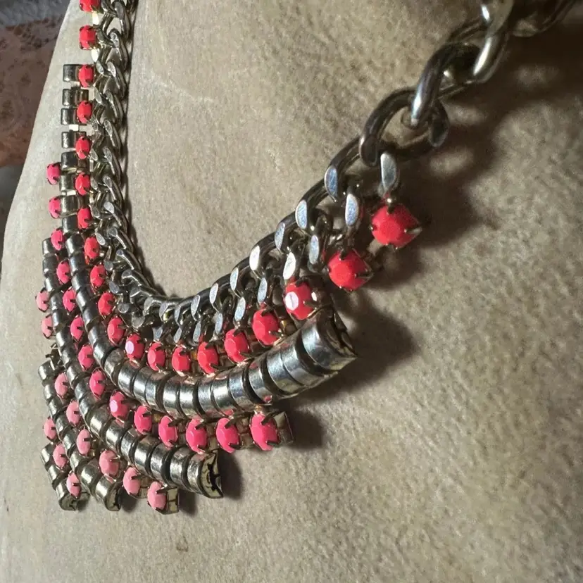 98. Coral colored necklace