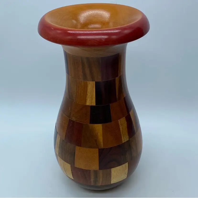 #4011 Handcrafted segmented wood vase featuring a checkered pattern and natural wood tones 7.5”