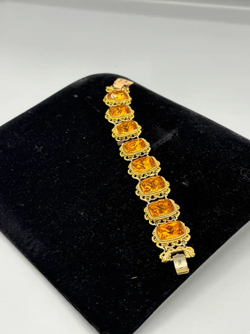 Vintage gold tone yellow stone