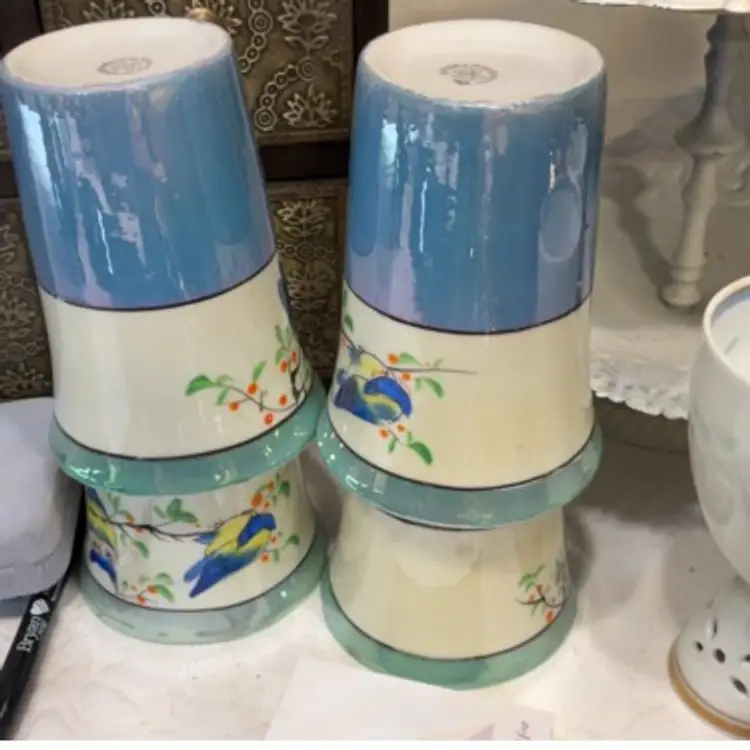 4 Ceramic Cups In Blue And White With Owls And Cherry Blossoms. Measure 4”x3”