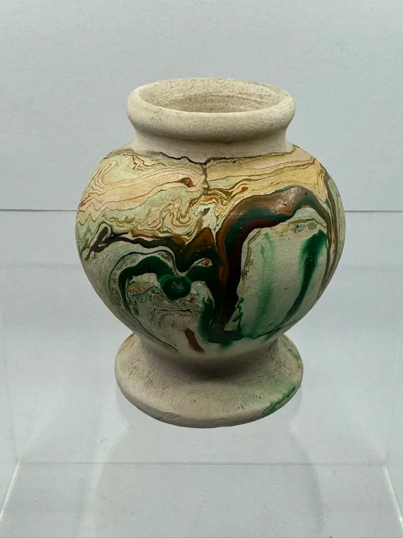 Vintage Nemadji Pottery marbled swirl vase with pedestal base.