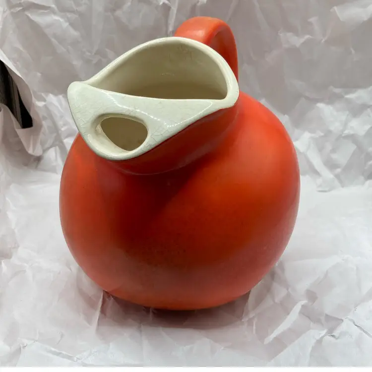McCoy Orange Pitcher 6.5” Tall. Capacity 64 Ounces