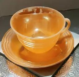 1 Fire King  3 Band Peach Luster Teacup and Saucer