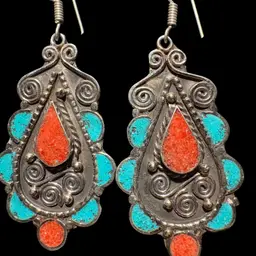 Handmade Tibetan silver earrings with coral and turquoise inlay.