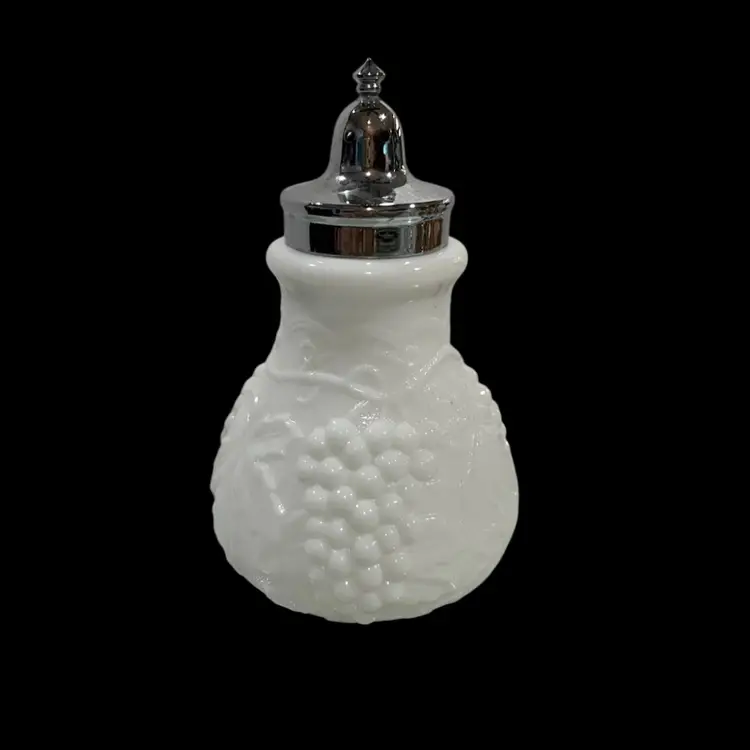 vintage Imperial Glass milk glass salt or pepper shaker in the "Vintage Grape" pattern with a metal lid