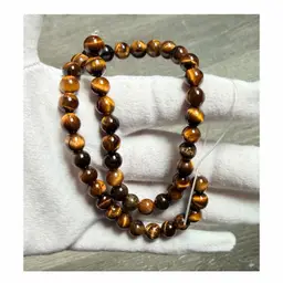 8mm Tigers Eye Round Glossy Center Drilled Beads 10” Strand
