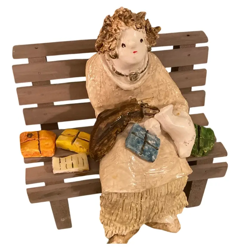 Pottery Lady In Bench
