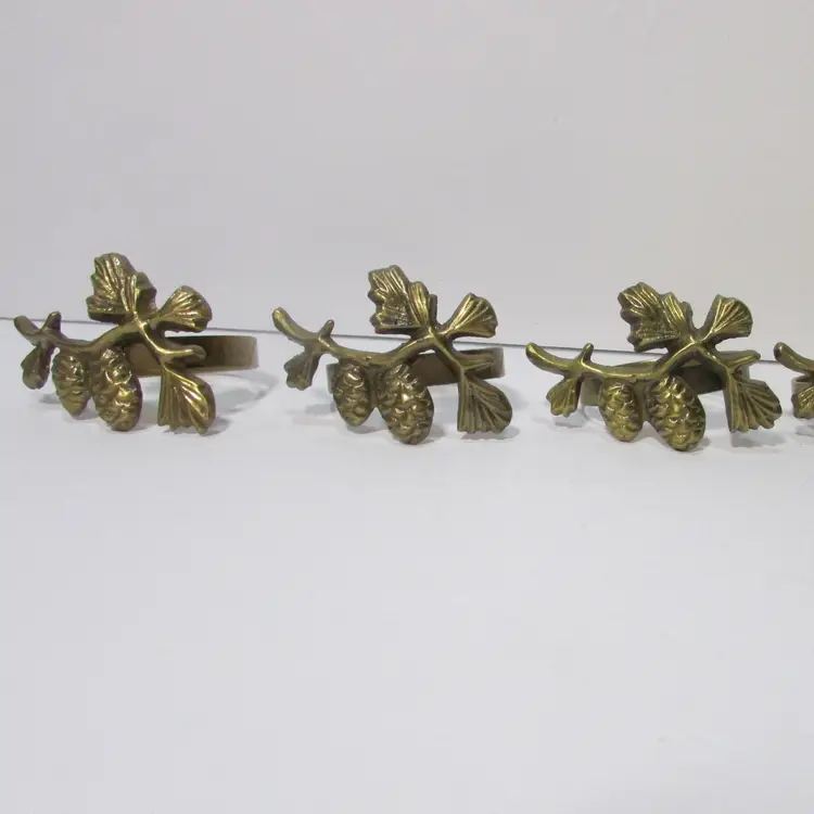 lot of 7 brass pine cones on branch napkin holder rings fall winter nature table decor