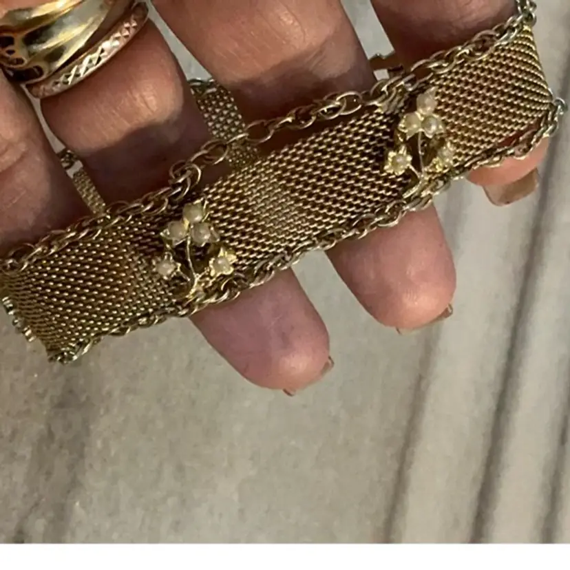 Vintage Goldette mesh bracelet with floral embellishments and faux pearls With A Fold Over Clasp 1950โs