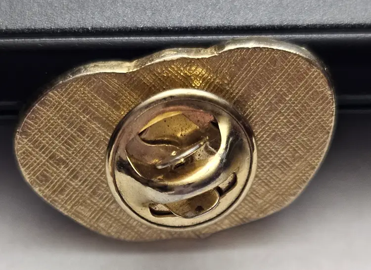 Vintage Freeport McDermott Classic Golden Circle Gold Tone Enamel Lapel Pin