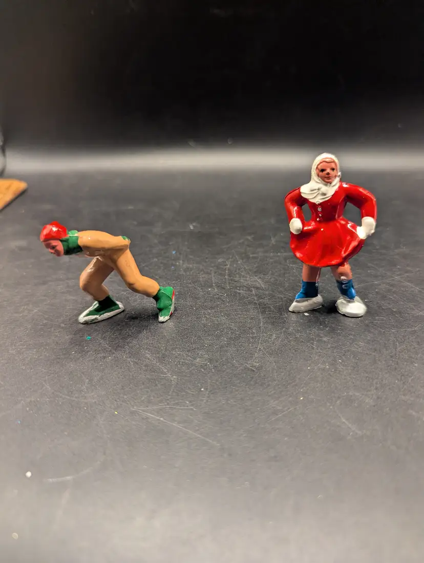 Vintage Set of 2 Barclay Type Metal Hand Painted Skaters Boy and Girl.