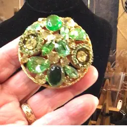 green brooch
