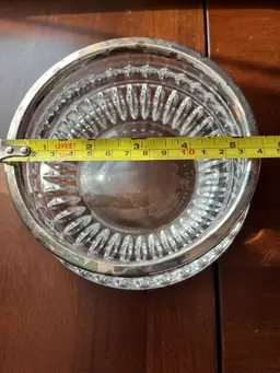 A Gorham Lyric pattern cut crystal serving bowl with a silver rim. 3H x5.5” W