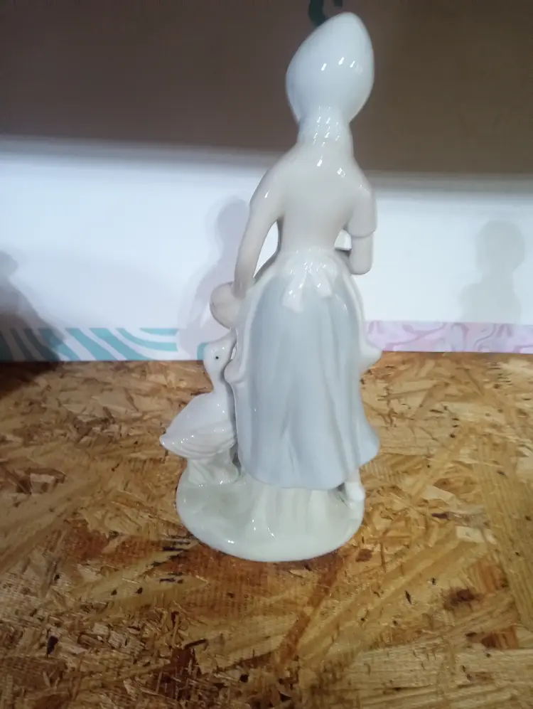White Porcelain Girl with Geese Figurine