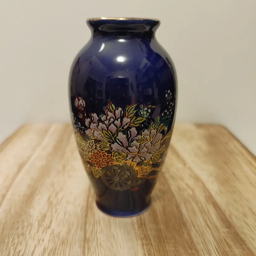 Vintage Asian vase. Cobalt blue flowers in cart. Made in Japan. No chips or cracks.