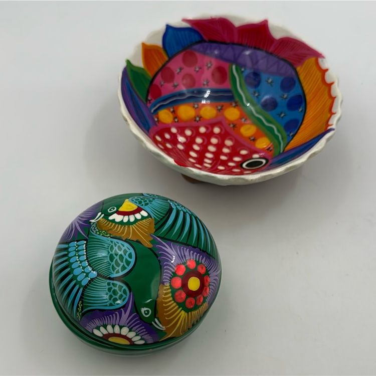 A Set Of Two Mexican folk art pottery footed on one