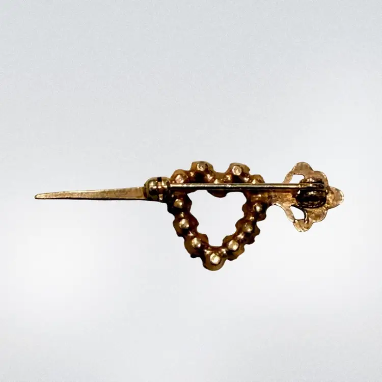 Vintage MCM Gold Plated Red Faceted Rhinestone Crystal Arrow Through My Heart Brooch 1.75”